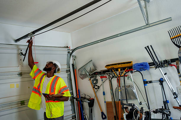 Professional Garage Door Roller Replacement technician working in Philomath, OR